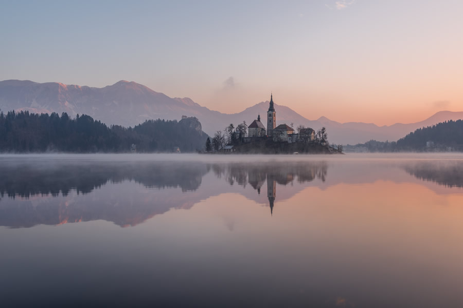 Decorative image. Private island in a lake at sunset.